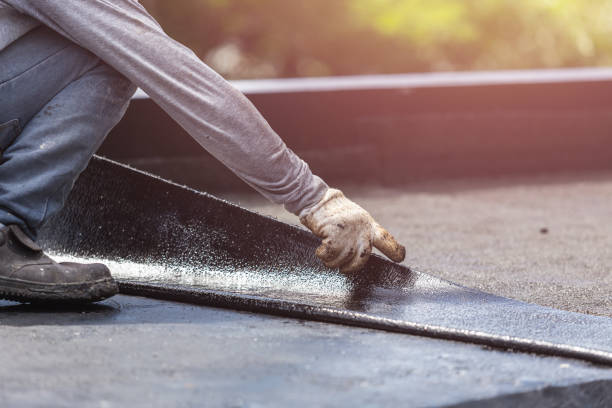 Professional Waterproofing technician working in Pikesville, MD